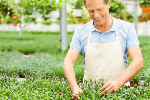 Trained gardener using PPE during outdoor work