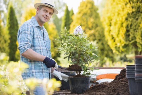 Local gardeners improving planting beds in Barkingside